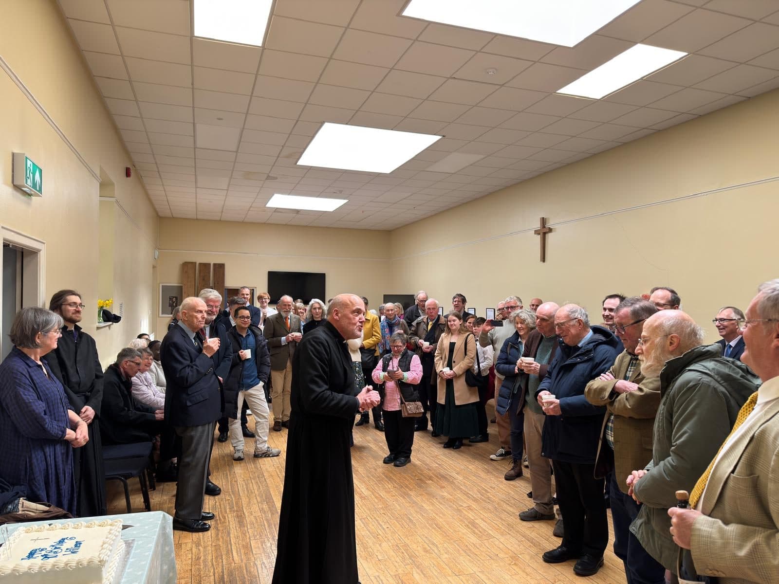 Parishioners gathered in the church hall after a service